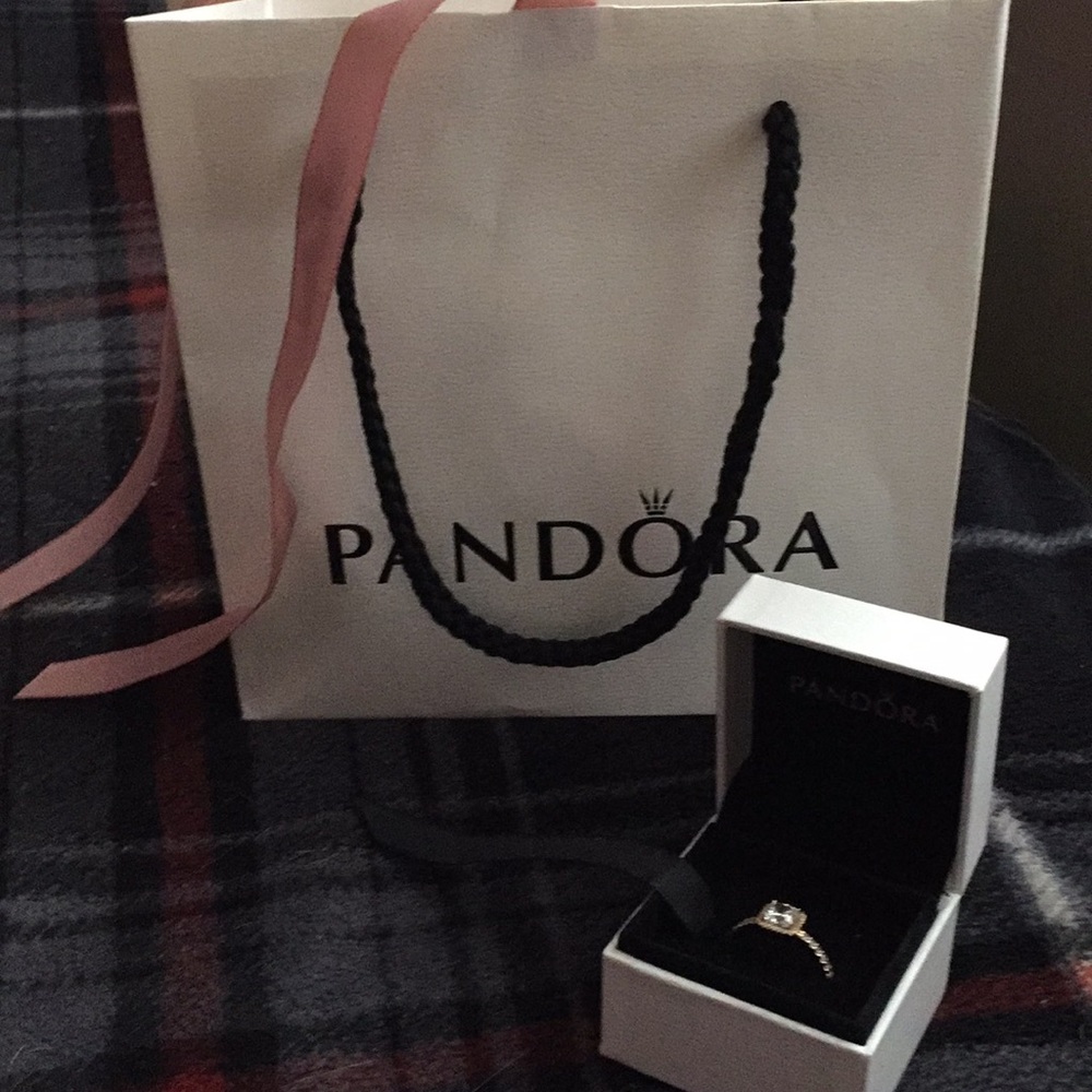 Pandora size 7 14k gold ring with stones.